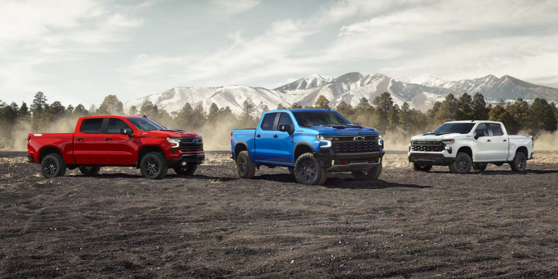 Three parked 2026 Chevrolet Silverado 1500 models
